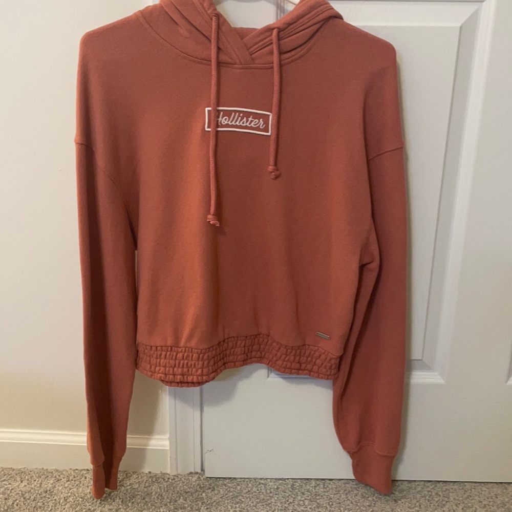 Women’s Hollister pink sweatshirt with cinched bottom size small